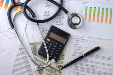Tools Used To Perfrom Medical Practice Risk Assessment Stethoscope Pen Calculator Charts