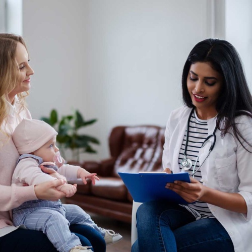 Mother with baby visiting pediatrician private practice insurance - MEDPLI helps doctors obtain malpractice insurance for their private practice