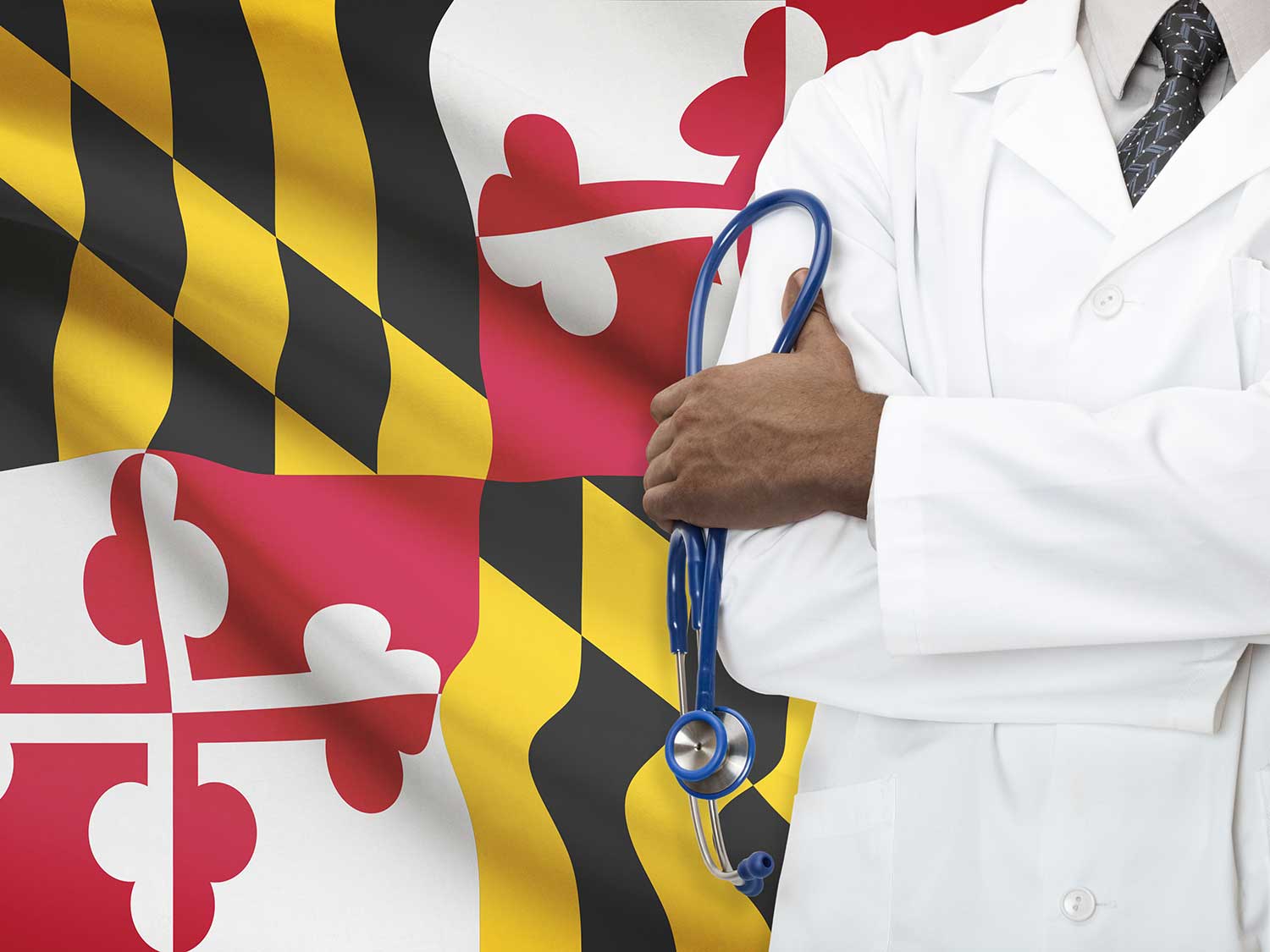 A Physician With A Liability Policy From MEDPLI Standing In Front Of The Maryland Flag