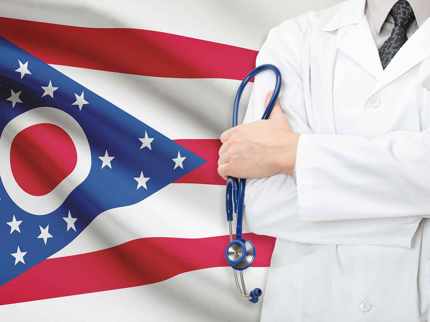 A Medical Practitioner With Malpractice Coverage Standing In Front Of The Ohio Flag
