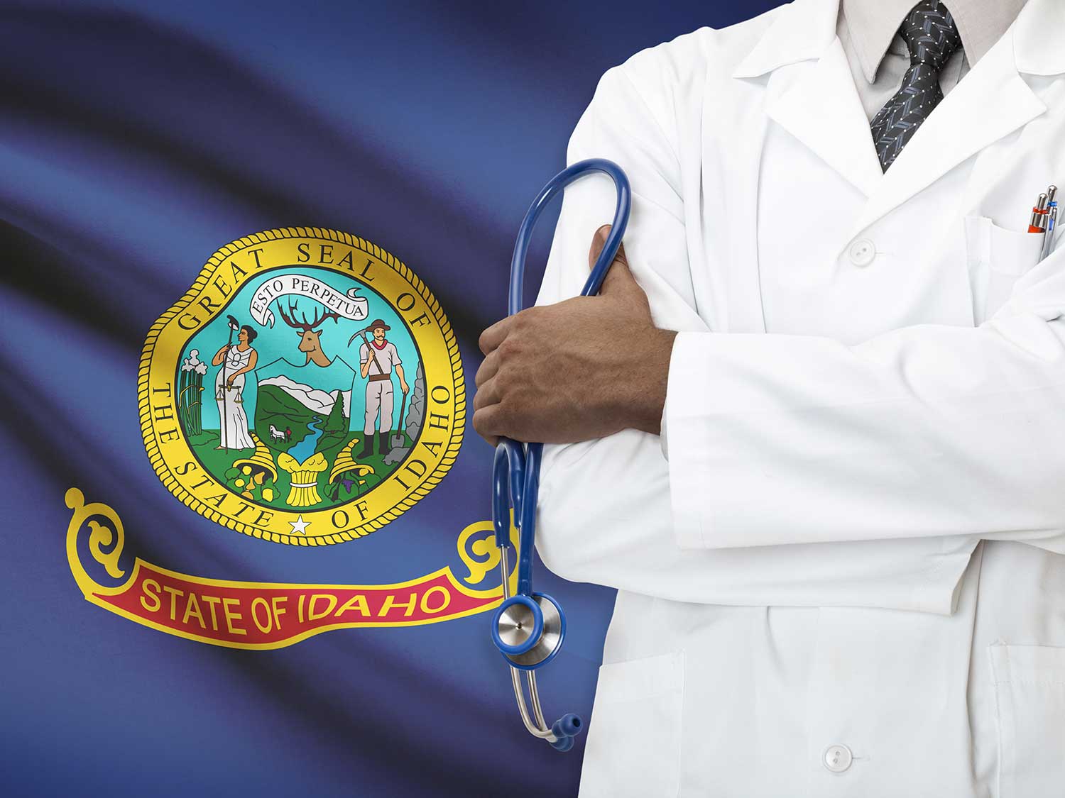 Doctor Standing In Front Of Idaho State Flag