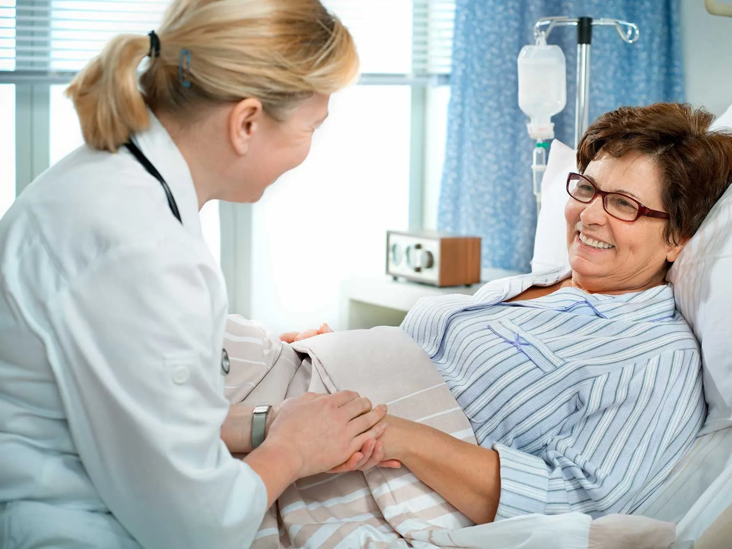 Hospitalist With Medical Malpractice Insurance Caring For An Older Female Patient In The Hospital