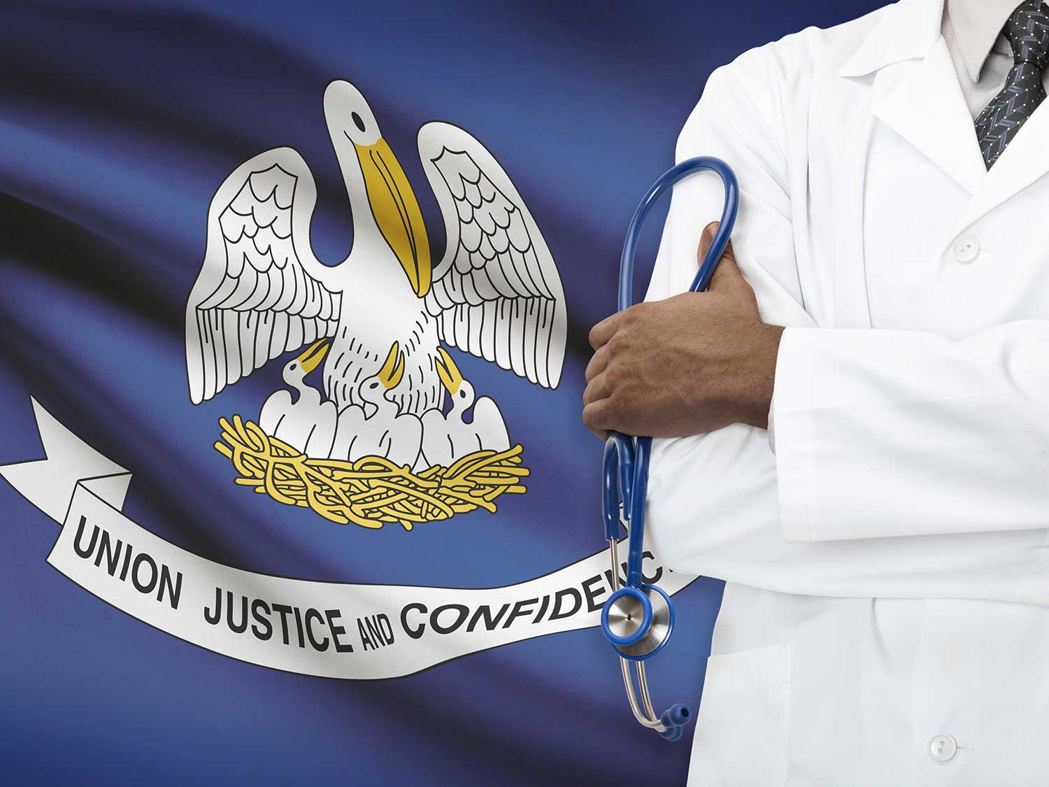 A Louisiana Medical Provider With Medical Malpractice Insurance Crossing His Arms In Front Of The Louisiana State Flag