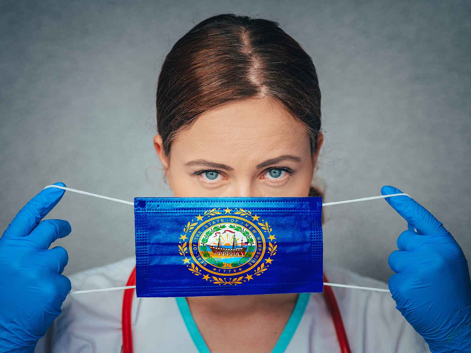 New Hampshire Doctor With Medical Malpractice Insurance Covering Her Face With A State Flag Surgical Mask